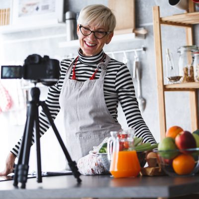 Woman filming video for her food channel