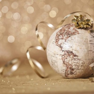 Globe Christmas bauble with gold ribbon